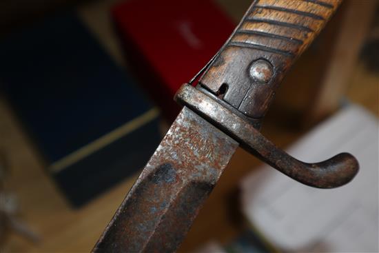 A kukri and a bayonet
